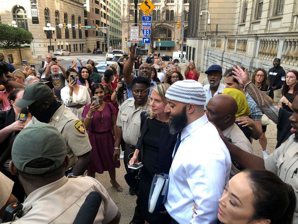 PHOTO: Adnan Syed, center, leaves the Cummings Courthouse on Sept. 19, 2022, in Baltimore.