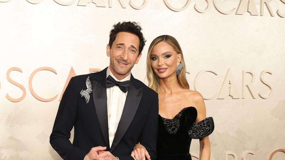 PHOTO: Adrien Brody and Georgina Chapman attend the 97th Annual Oscars at Dolby Theatre, on March 2, 2025, in Hollywood, Calif.