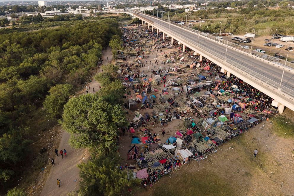 PHOTO: Migrants, many from Haiti, are seen at an encampment along the Del Rio International Bridge near the Rio Grande, Sept. 21, 2021, in Del Rio, Texas.