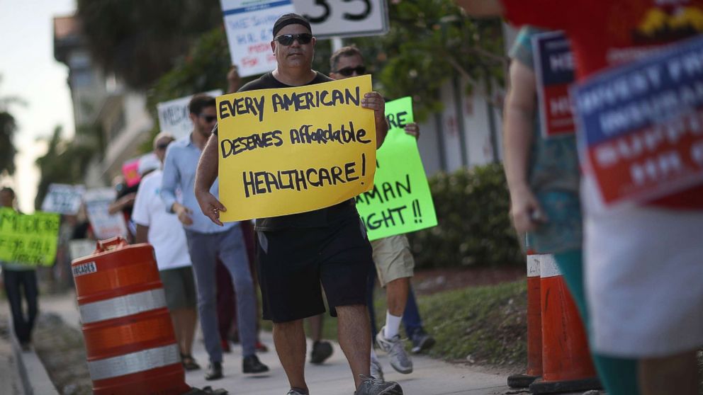 People march in favor of universal, affordable, quality healthcare for all on July 24, 2017 in Fort Lauderdale, Fla.