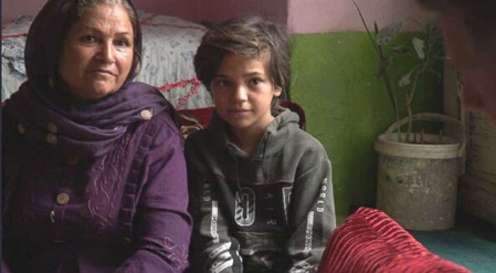 PHOTO: Zarlasht sits next to her mother.