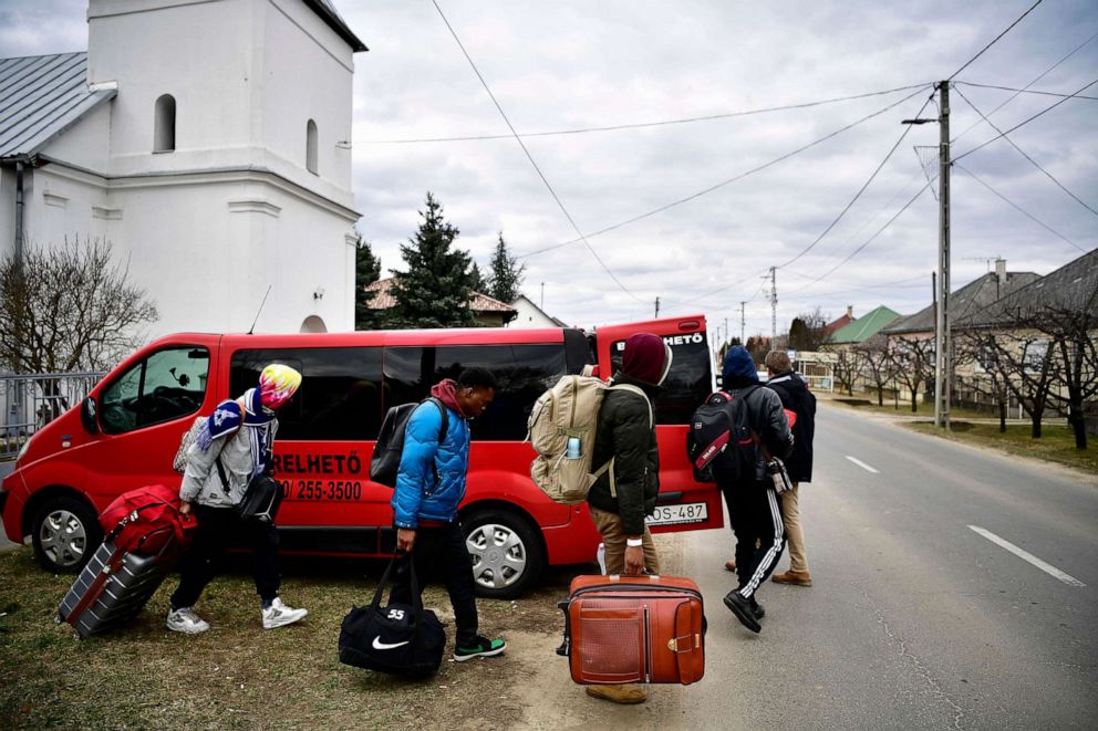 PHOTO: Students from Nigeria load their luggage into the car to go to Budapest after fleeing the Russian invasion of Ukraine, in Vasarosnameny, Hungary, on March 5, 2022.