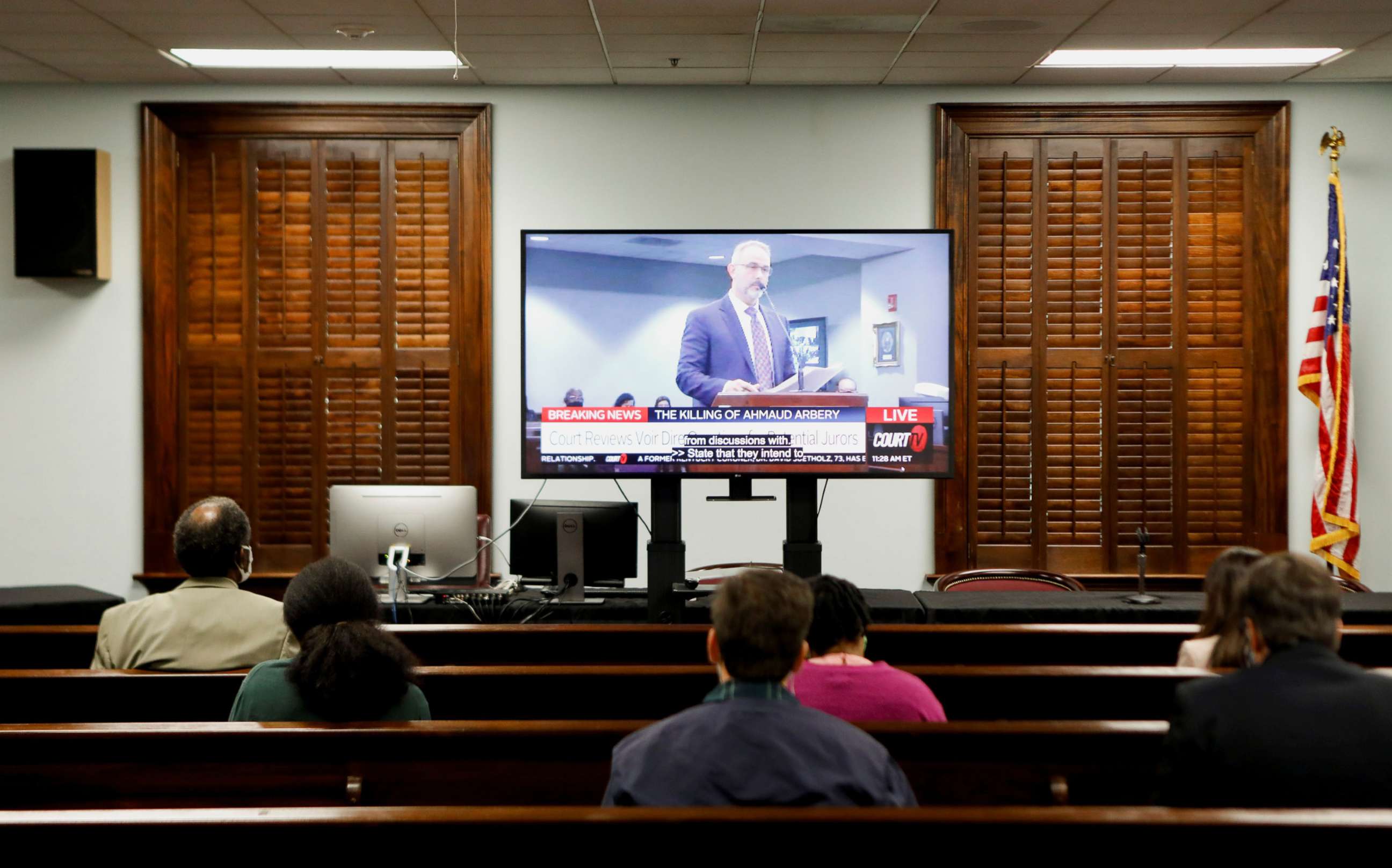 PHOTO: An attorney is seen on a TV screen while court discusses pending motions ahead of the jury selection in Ahmaud Arbery's murder trial, at the Glynn County Courthouse, in Brunswick, Ga., Oct. 18, 2021.
