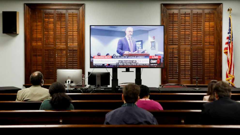 PHOTO: An attorney is seen on a TV screen while court discusses pending motions ahead of the jury selection in Ahmaud Arbery's murder trial, at the Glynn County Courthouse, in Brunswick, Ga., Oct. 18, 2021.