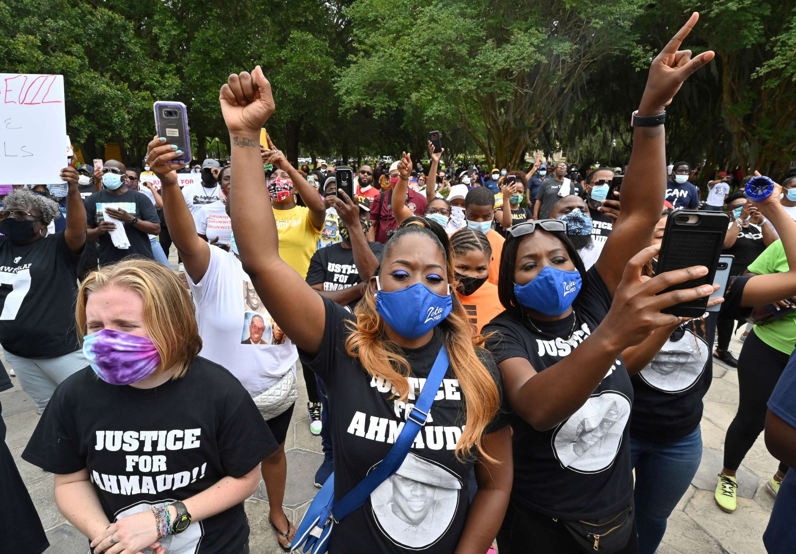 PHOTO: Protesters gather outside the Glynn County Courthouse during a rally to protest the shooting of Ahmaud Arbery, Saturday, May 16, 2020, in Brunswick, Ga.