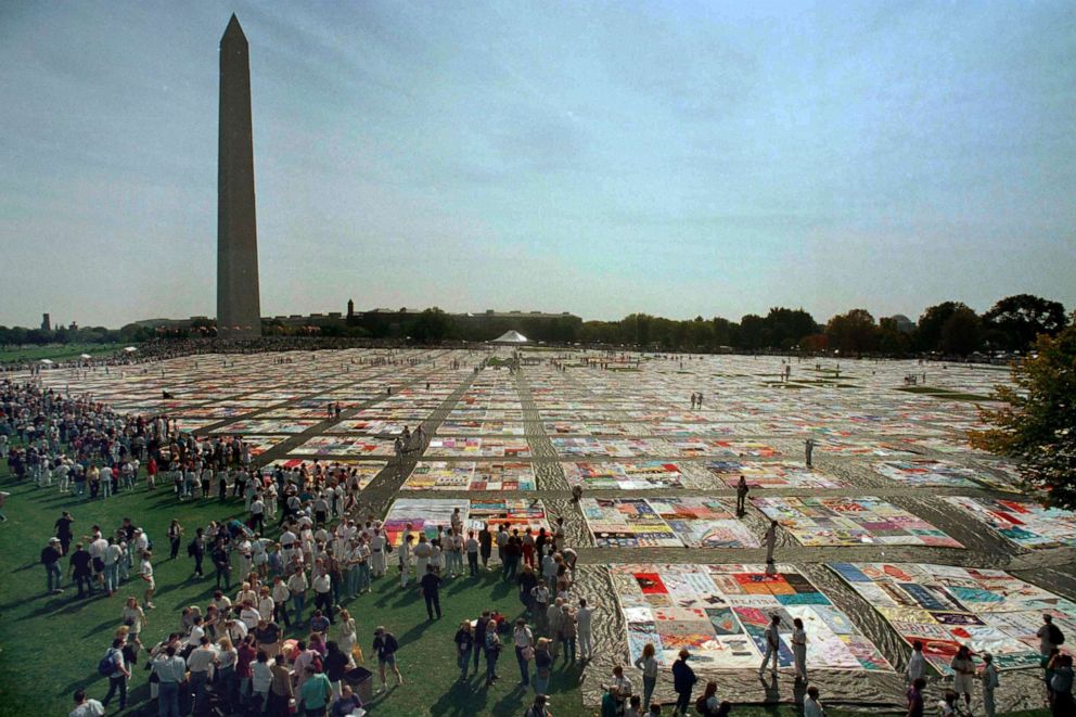 PHOTO: People visit the Names Project AIDS Memorial Quilt in Washington, D.C., Oct. 10, 1992.