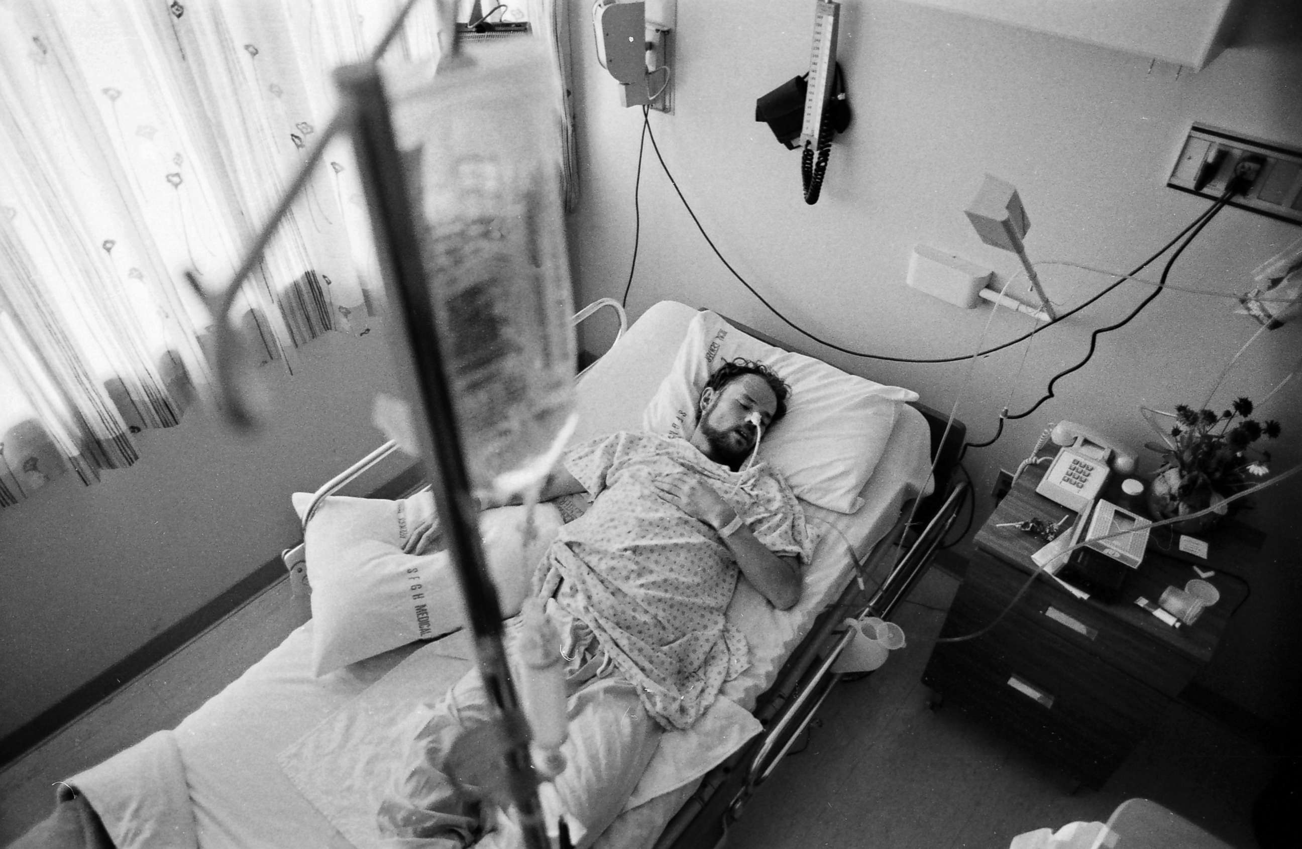 PHOTO: AIDS patient Deotis McMather sleeps in bed at San Francisco General Hospital's AIDS ward 5B, circa 1983.