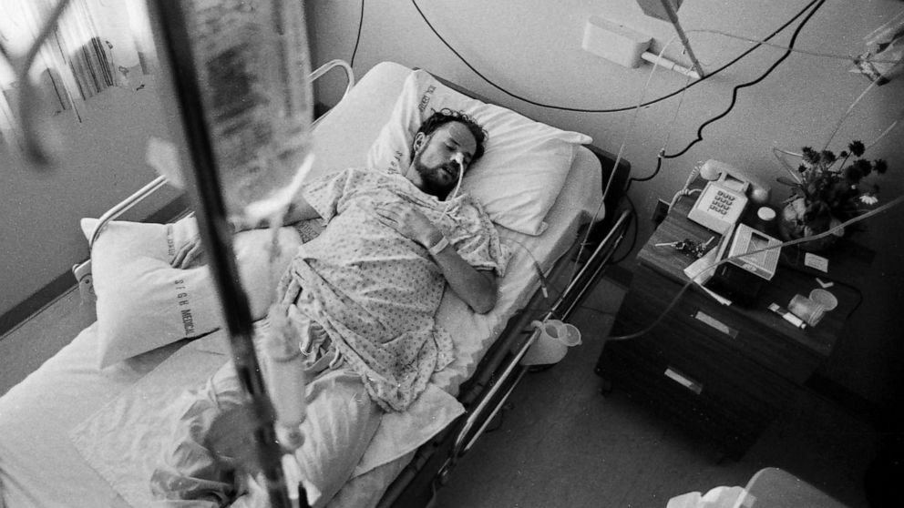 PHOTO: AIDS patient Deotis McMather sleeps in bed at San Francisco General Hospital's AIDS ward 5B, circa 1983.
