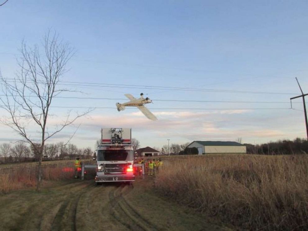 PHOTO: The pilot of a small plane was rescued after it crashed into a power line in Louisville Township, Minnesota.
