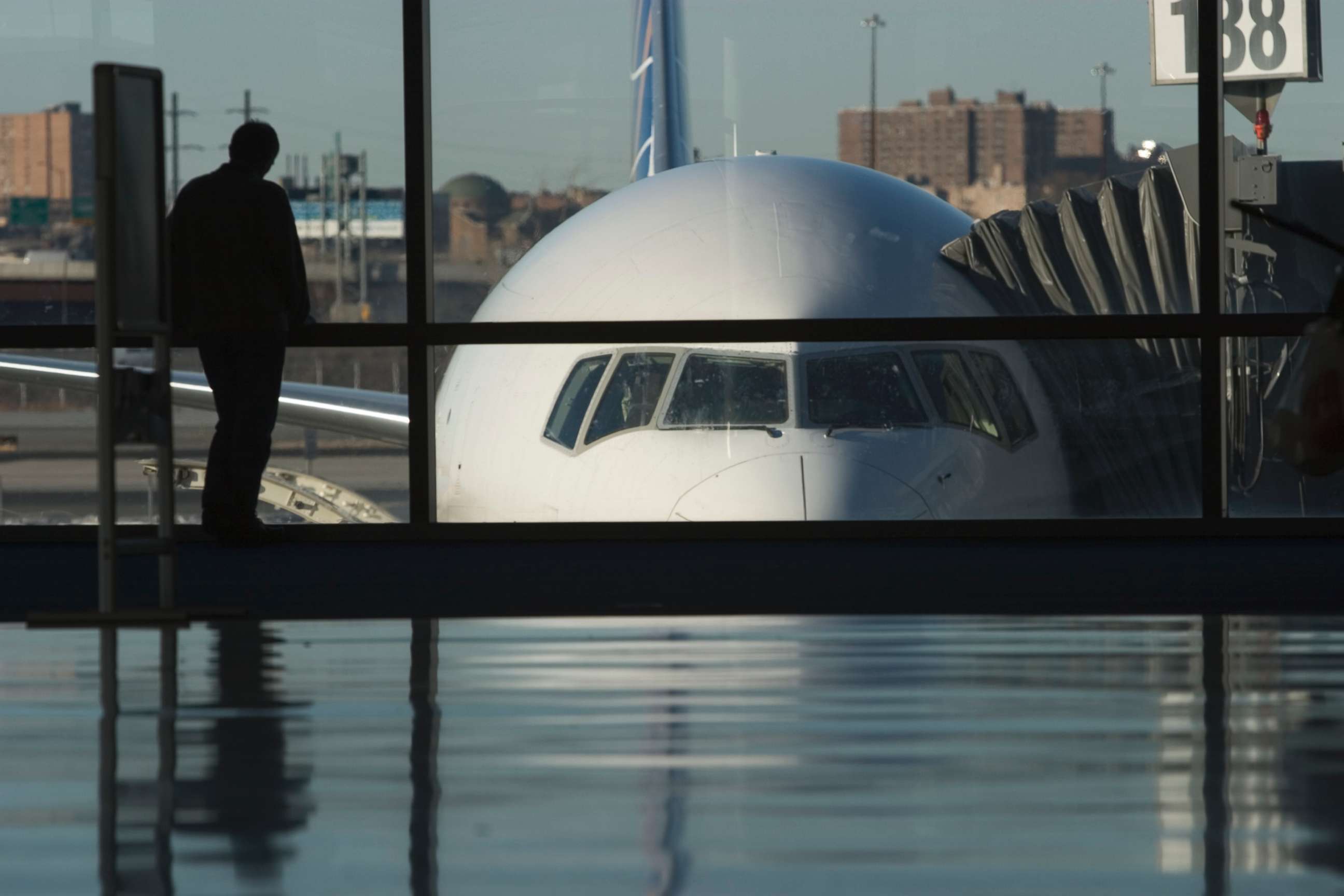 PHOTO: A passenger waits at Newark International Airport. 
