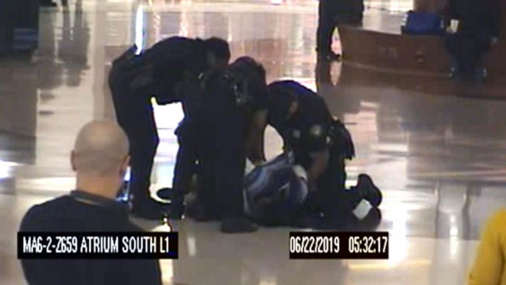 PHOTO: Police arrest a woman they say was captured on video trying to kidnap two children at the airport in Atlanta, June 22, 2019.