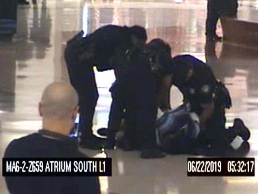 PHOTO: Police arrest a woman they say was captured on video trying to kidnap two children at the airport in Atlanta, June 22, 2019.
