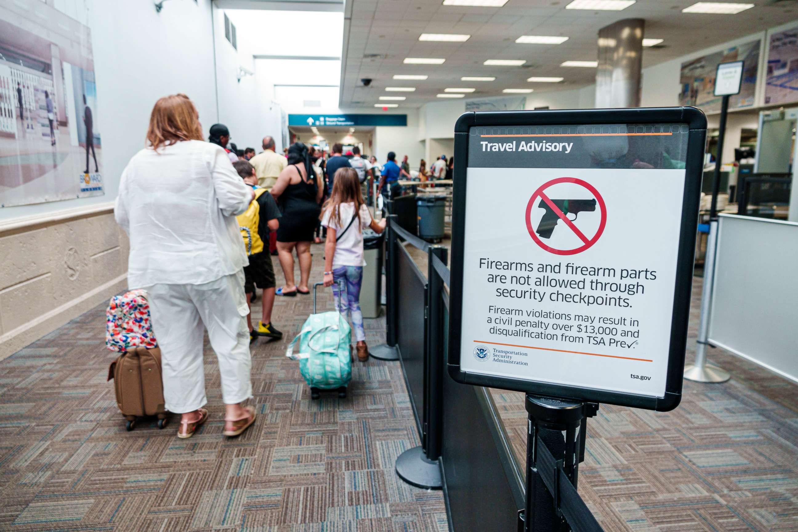 PHOTO: A sign at a security checkpoint in the Fort Lauderdale-Hollywood International Airport warns that firearms are not allowed, in Fort Lauderdale, Fla., Aug. 19, 2019.