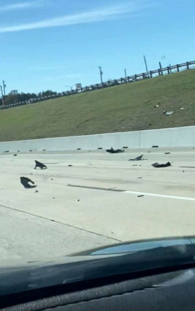  In this surface  drawback   from a video, debris is shown connected  a road  aft  a clang  astatine  a World War II airshow astatine  Dallas Executive Airport, Nov. 12, 2022.