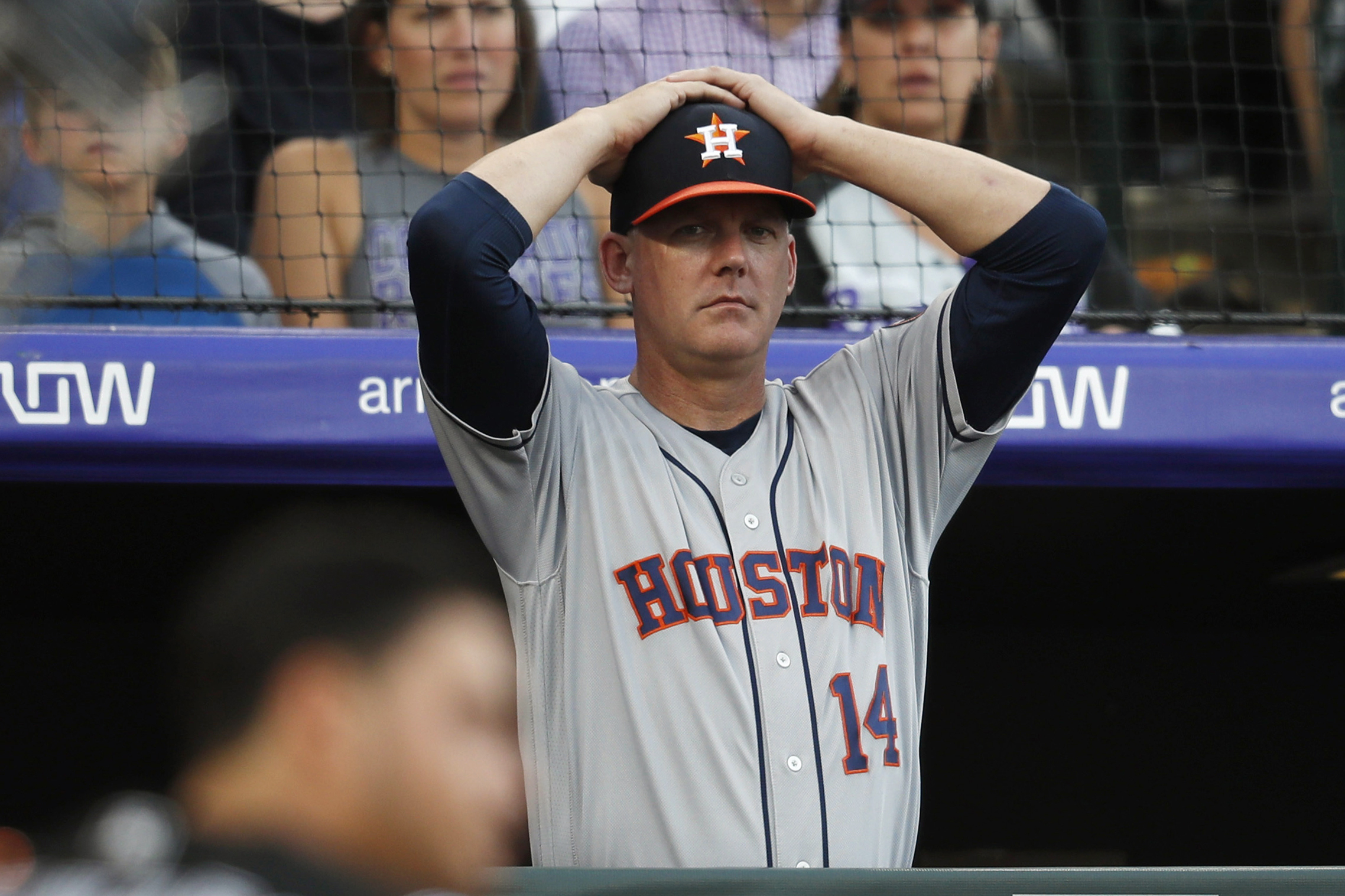 PHOTO: Houston Astros manager AJ Hinch reacts during a baseball game against the Colorado Rockies, in Denver, July 19, 2019.
