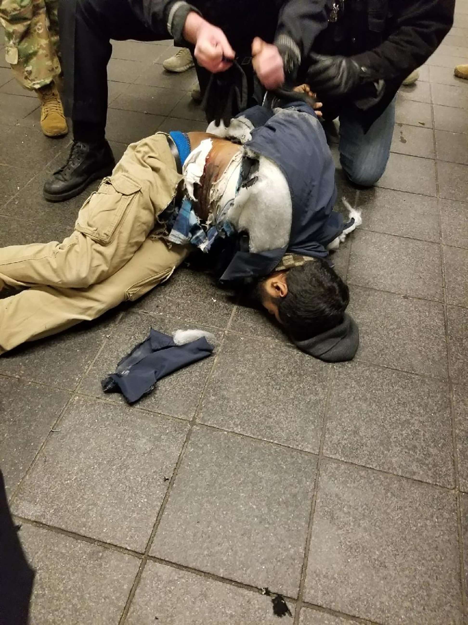 PHOTO: Police take down Akayed Ullah in New York in a photo widely shared on social media, Dec. 11, 2017. 