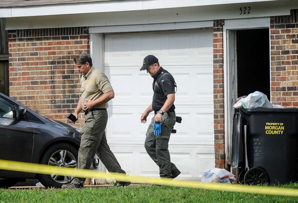 PHOTO: Morgan County, Ala. investigators work at the scene, Friday, June 5, 2020, in Valhermoso Springs, Ala., where numerous people were found fatally shot. Deputies responding to a call about a shooting in Alabama found seven people dead inside a home.