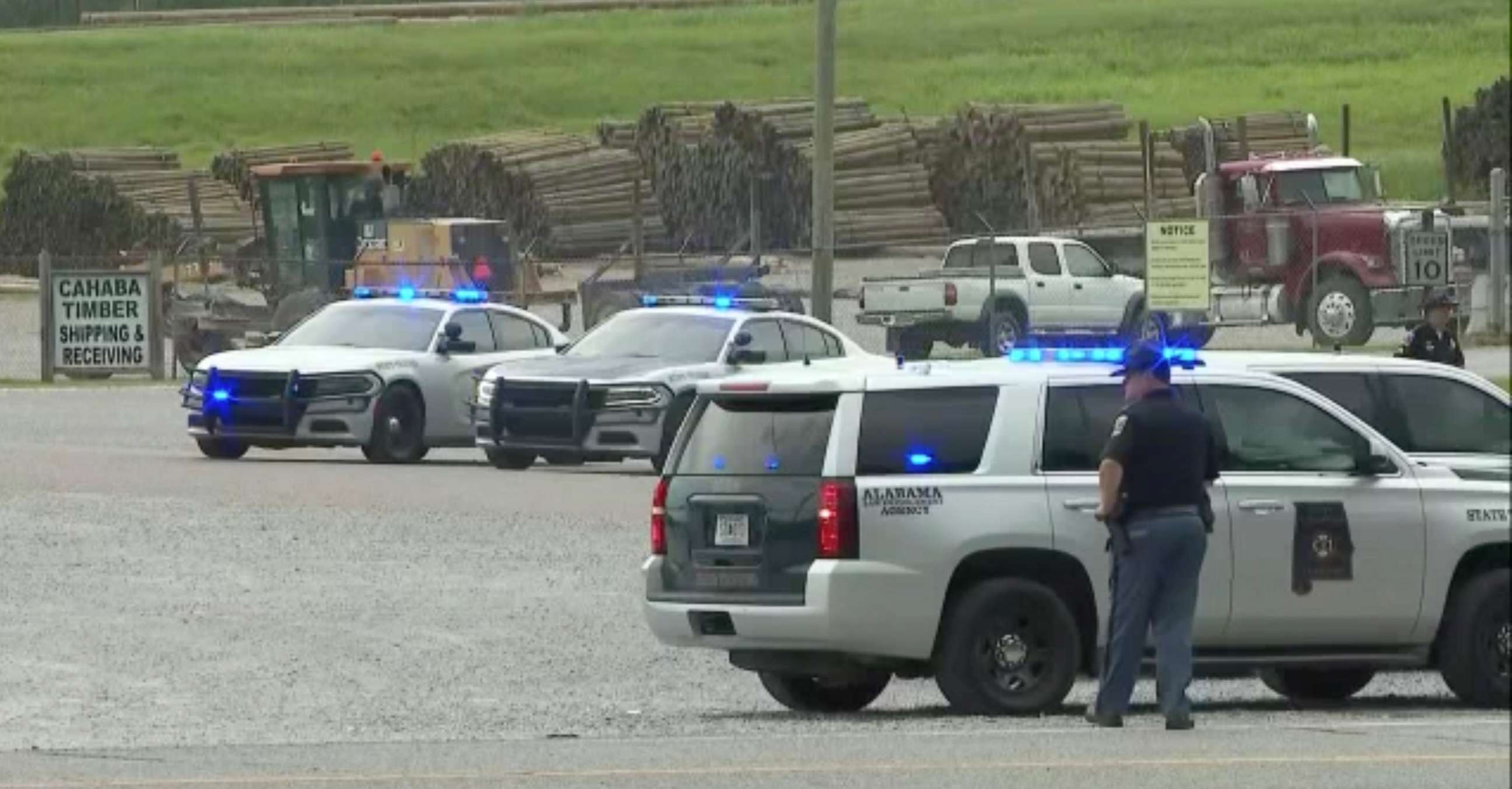 PHOTO: Law enforcement at the scene after two Bibb County Sheriff's Office deputies were shot on Highway 25 in Bibb County, Ala., June 29, 2022.
