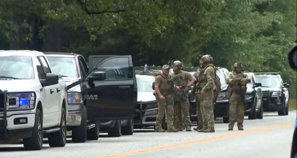 PHOTO: Law enforcement at the scene after two Bibb County Sheriff's Office deputies were shot on Highway 25 in Bibb County, Ala., June 29, 2022.