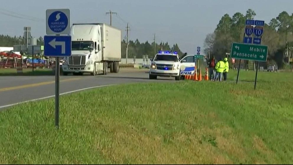 PHOTO: Emergency personnel near the site where a bus carrying high school students from Texas crashed into a ravine in Baldwin County, Alabama, March 13, 2018.