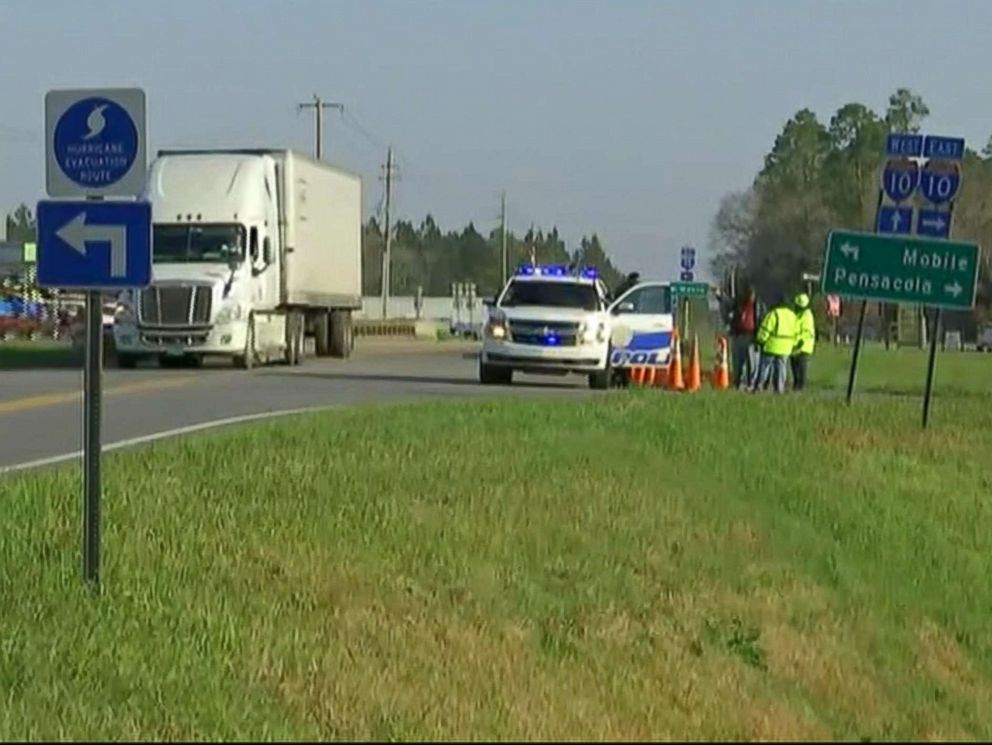 PHOTO: Emergency personnel near the site where a bus carrying high school students from Texas crashed into a ravine in Baldwin County, Alabama, March 13, 2018.