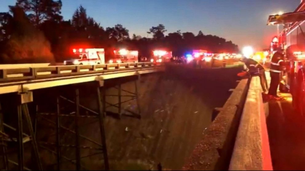 PHOTO: Emergency vehicles and personnel  at the site of a bus crash on I-10 in Alabama. The bus was carrying high school band students from the Houston area according to school officials.