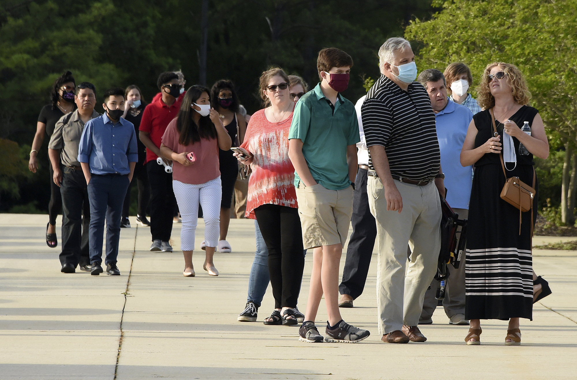 PHOTO: Friends and family members attend Spain Park High School's graduation ceremony at the Hoover Met, in Hoover, Ala., May 20, 2020.