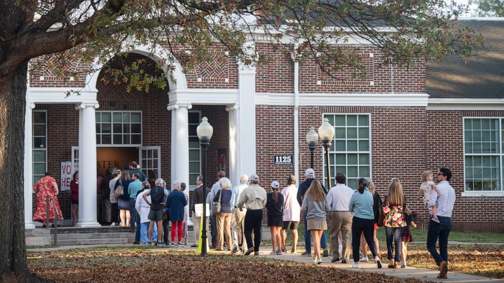 PHOTO: Voters line up at the polls just before they open at Huntingdon College in Montgomery, Ala., Nov. 8, 2022.