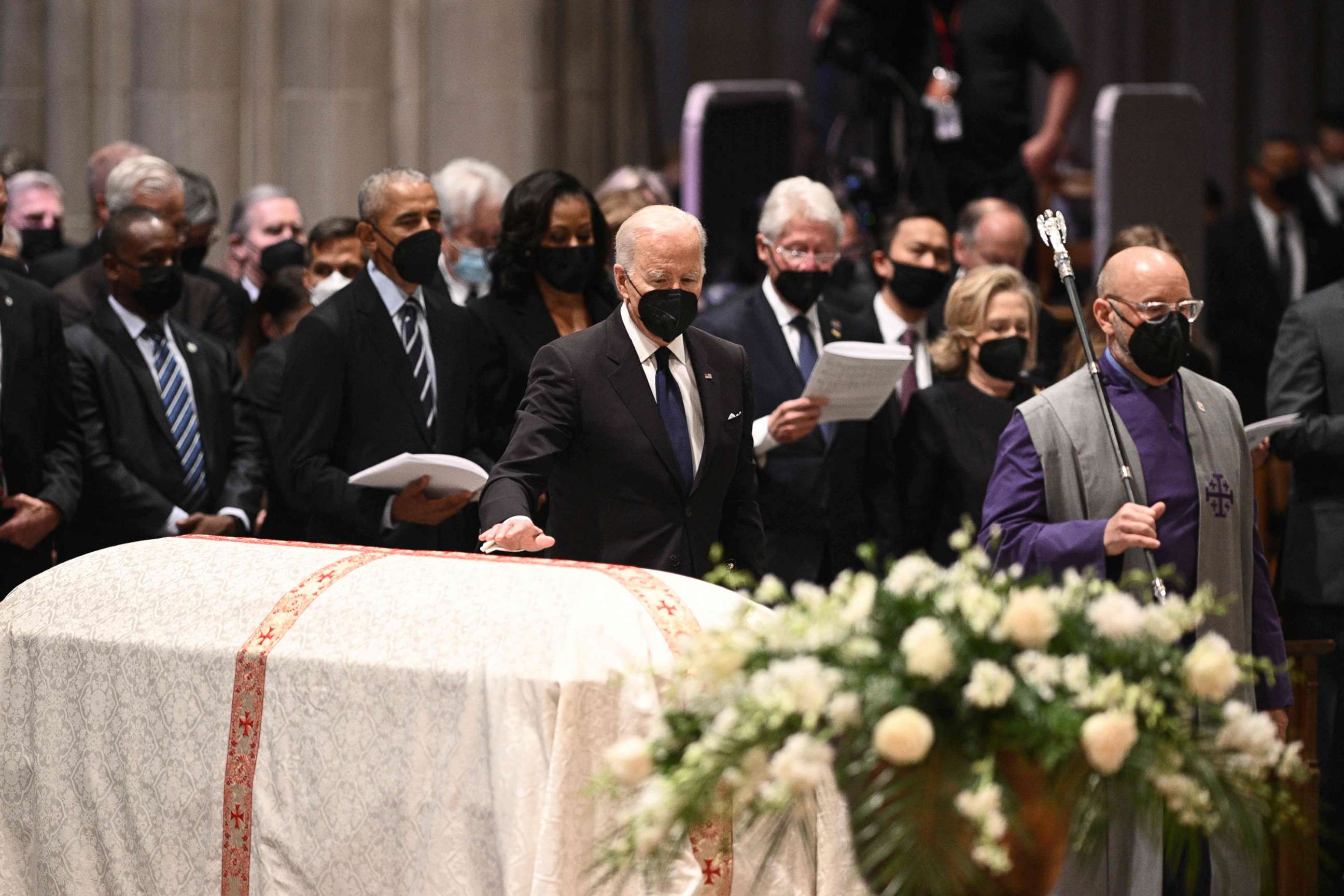 PHOTO: President Joe Biden pays his respects at the casket of former Secretary of State Madeleine Albright during a funeral service at the Washington National Cathedral in Washington, D.C., on April 27, 2022.