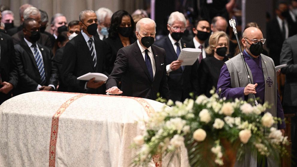 PHOTO: President Joe Biden pays his respects at the casket of former Secretary of State Madeleine Albright during a funeral service at the Washington National Cathedral in Washington, D.C., on April 27, 2022.
