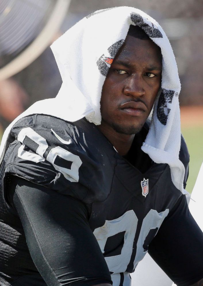 PHOTO: Oakland Raiders' Aldon Smith cools off during an NFL football game against the Baltimore Ravens in Oakland, Calif., Sept. 20, 2015.