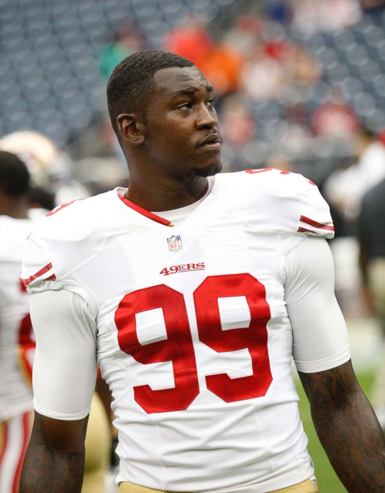 PHOTO: Aldon Smith of the San Francisco 49ers stands on the field prior to the game against the Houston Texans at Reliant Stadium, Aug. 28, 2014 in Houston.
