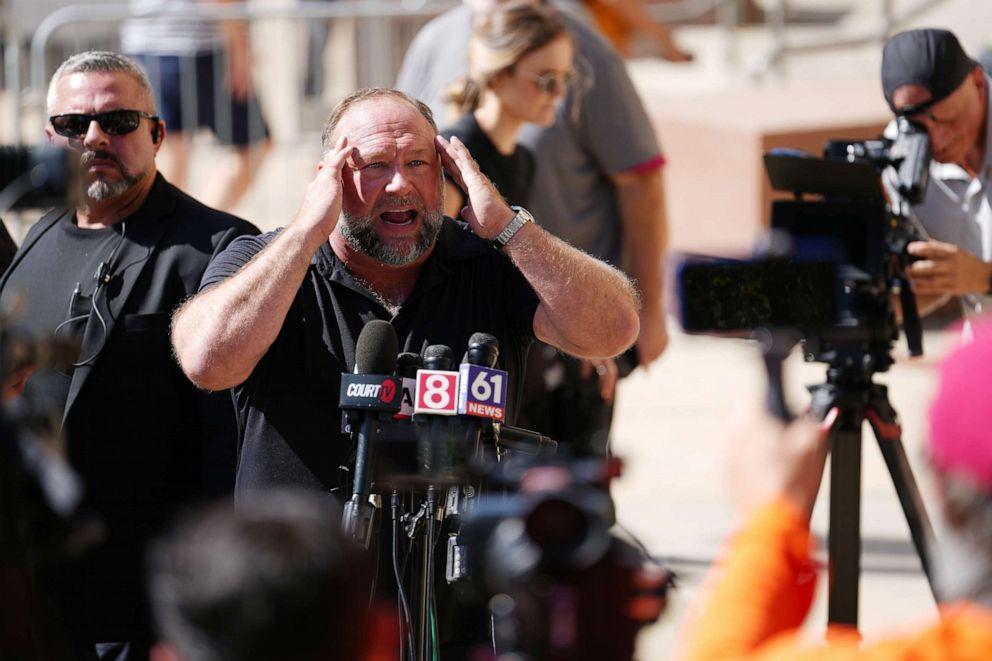 PHOTO: InfoWars founder Alex Jones speaks to the media outside Waterbury Superior Court during his trial September 21, 2022 in Waterbury, Connecticut.