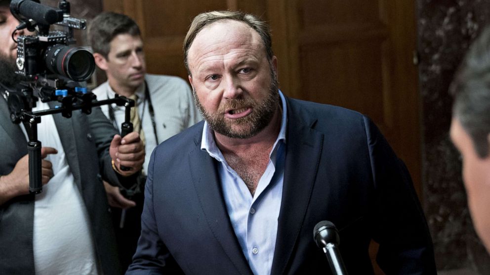 PHOTO: Alex Jones, radio host and creator of the website InfoWars, speaks to members of the media outside a Senate Intelligence Committee hearing in Washington, D.C., Sept. 5, 2018.