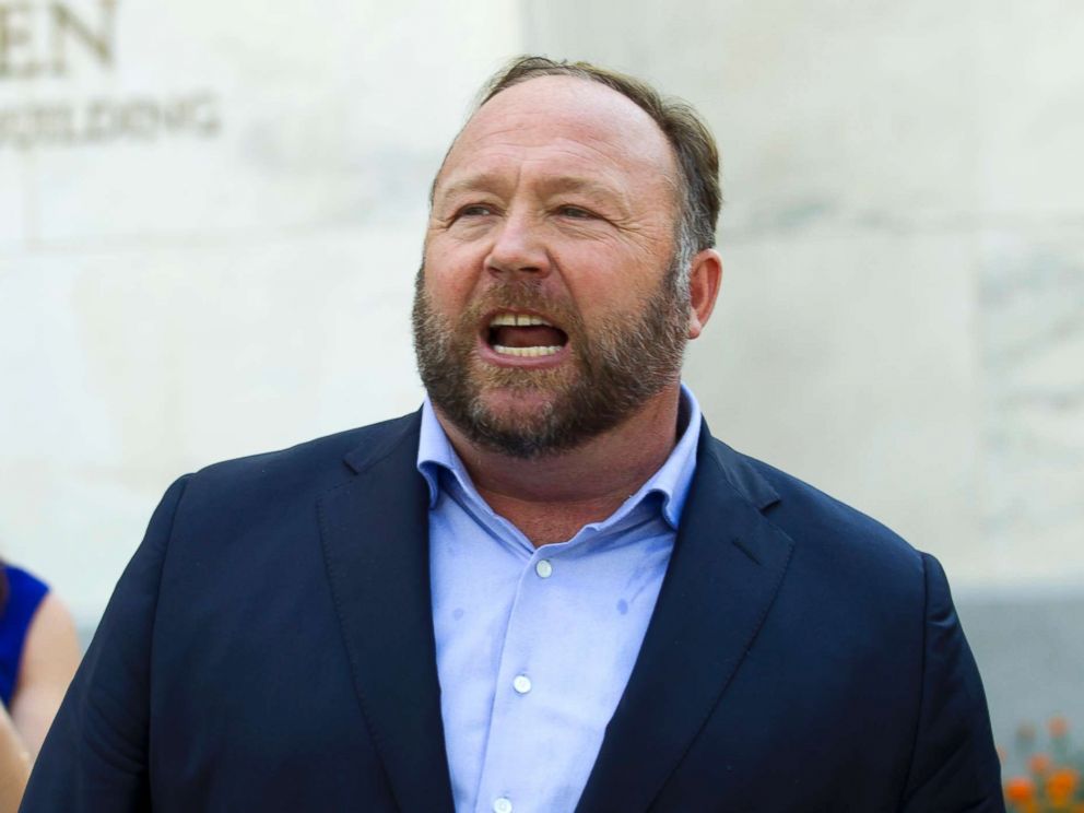 PHOTO: Conspiracy theorist Alex Jones speaks outside after listening to a Senate Intelligence Committee meeting on Capitol Hill, Sept. 5, 2018, in Washington.