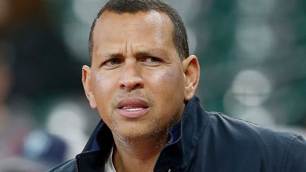 Former New York Yankee and ESPN commentator Alex Rodriguez watches batting practice at Minute Maid Park on April 14, 2018 in Houston.