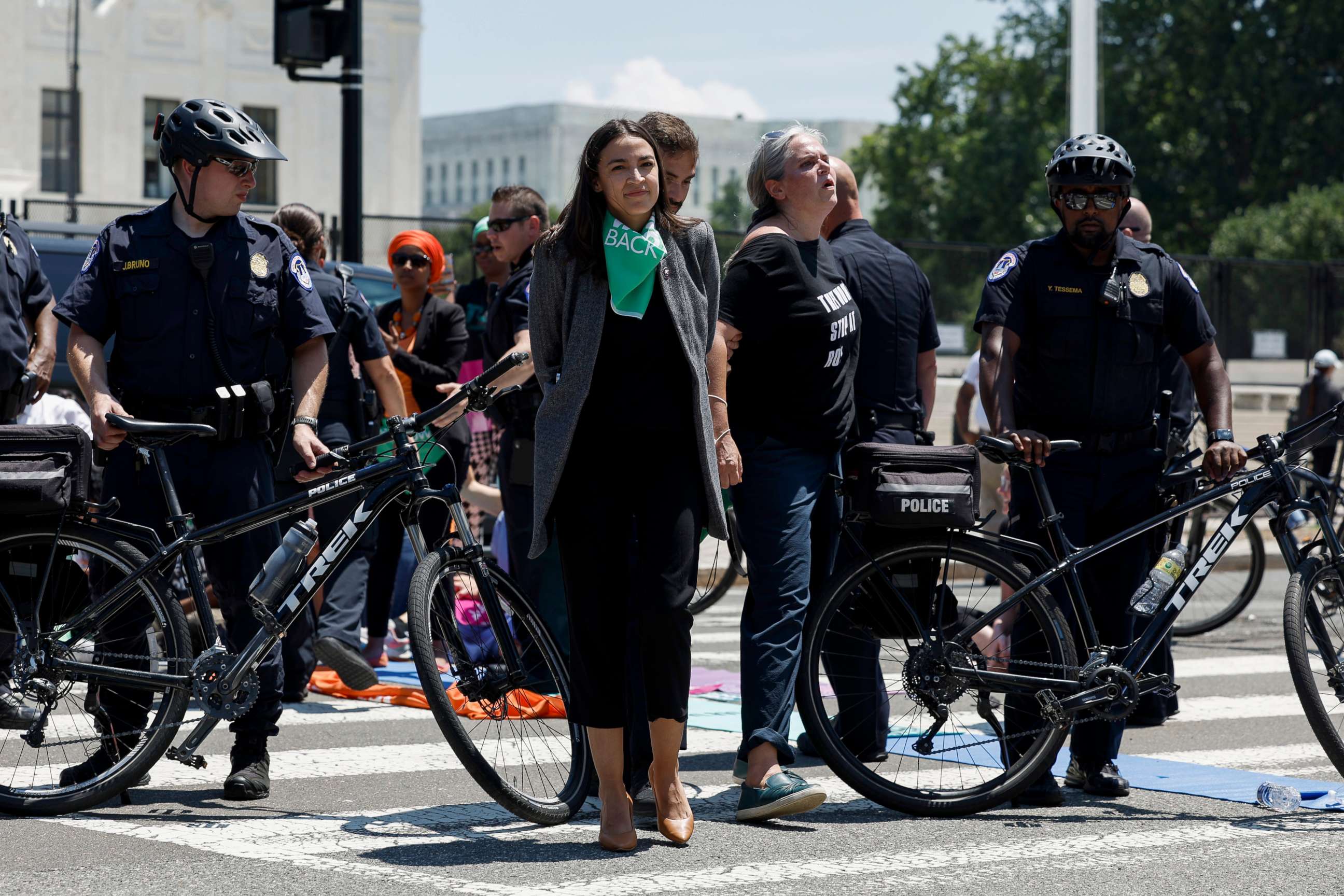 PHOTO: Rep. Alexandria Ocasio-Cortez is detained after participating in a sit in with activists from Center for Popular Democracy Action in front of the U.S. Supreme Court Building on July 19, 2022 in Washington, DC.