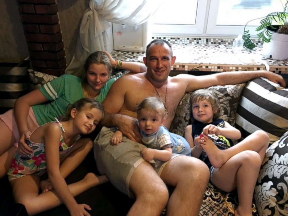 PHOTO: Alexey Oleynik, center, is seen with four out of his five children in this undated photo. From left; Polina, Diana, Pavel and Aleksei.