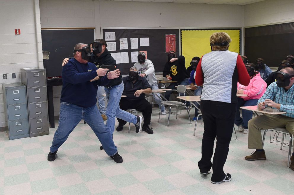 PHOTO: An "active shooter (L)" is tackled during ALICE (Alert, Lockdown, Inform, Counter and Evacuate) training at the Harry S. Truman High School in Levittown, Penn., Nov. 3, 2015.