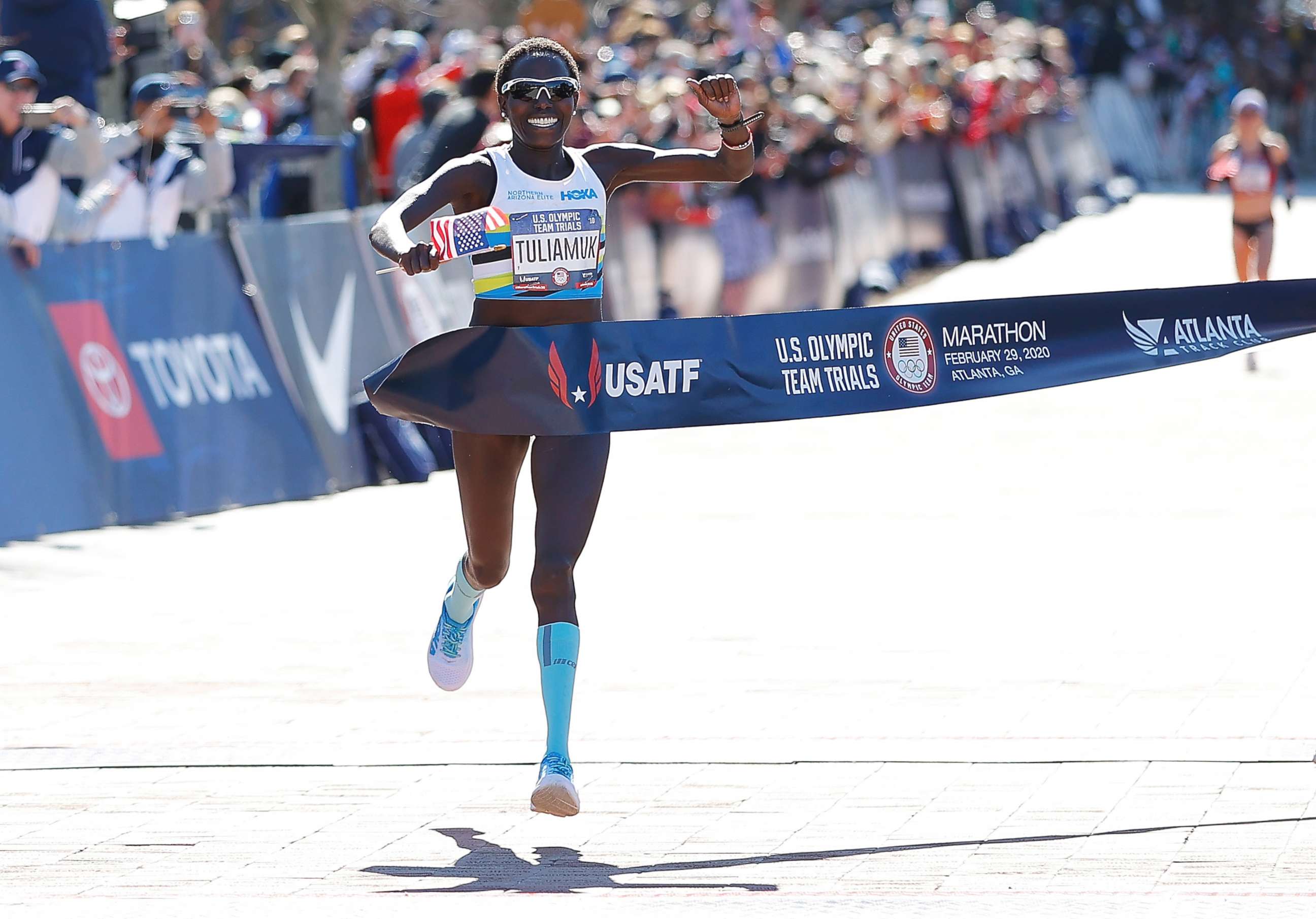 PHOTO: Aliphine Tiliamuk reacts as she crosses the finish line to win the Women's U.S. Olympic marathon team trials on Feb. 29, 2020, in Atlanta.