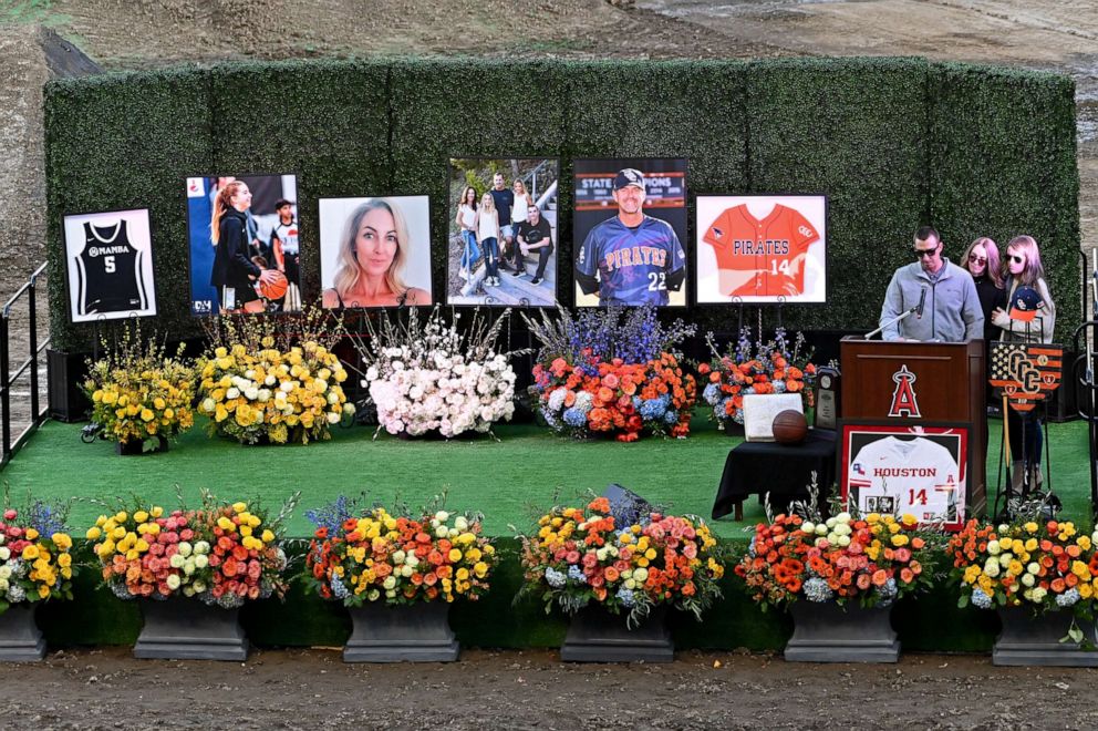 PHOTO: Family members speak during a memorial service honoring of John Altobelli, his wife, Keri, and their daughter Alyssa at Angel Stadium of Anaheim in Anaheim, Calif., Feb. 10, 2020.