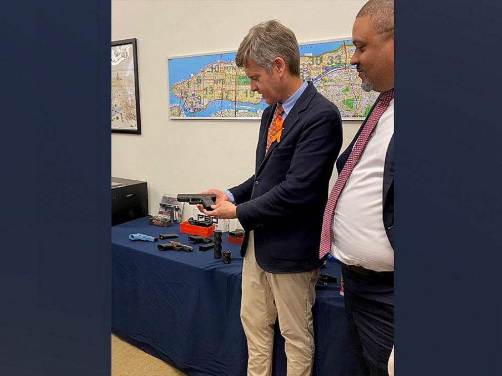 PHOTO: State Sen. Brad Hoylman and Manhattan District Attorney Alvin Bragg inspect a 3D printed gun.