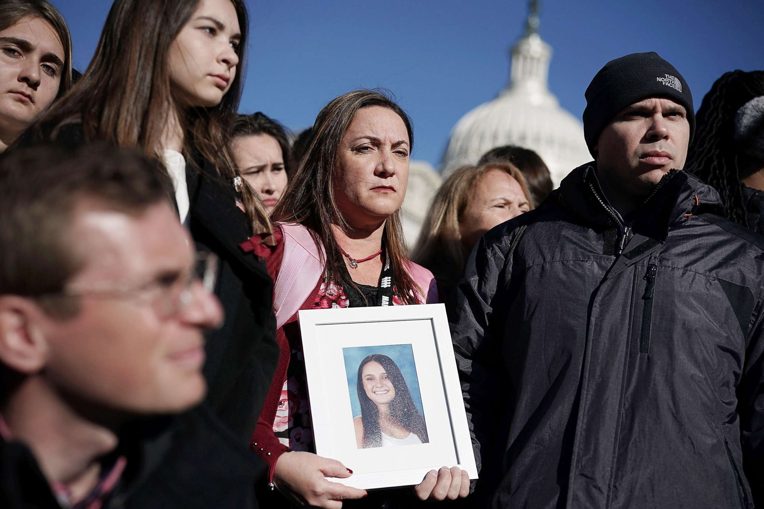 PHOTO: Lori Alhadeff and her husband Ilan Alhadeff right, hold a picture of their daughter Alyssa Alhadeff, a Marjory Stoneman Douglas High School shooting victim, during a news conference on gun control in Washington, D.C., March 23, 2018.