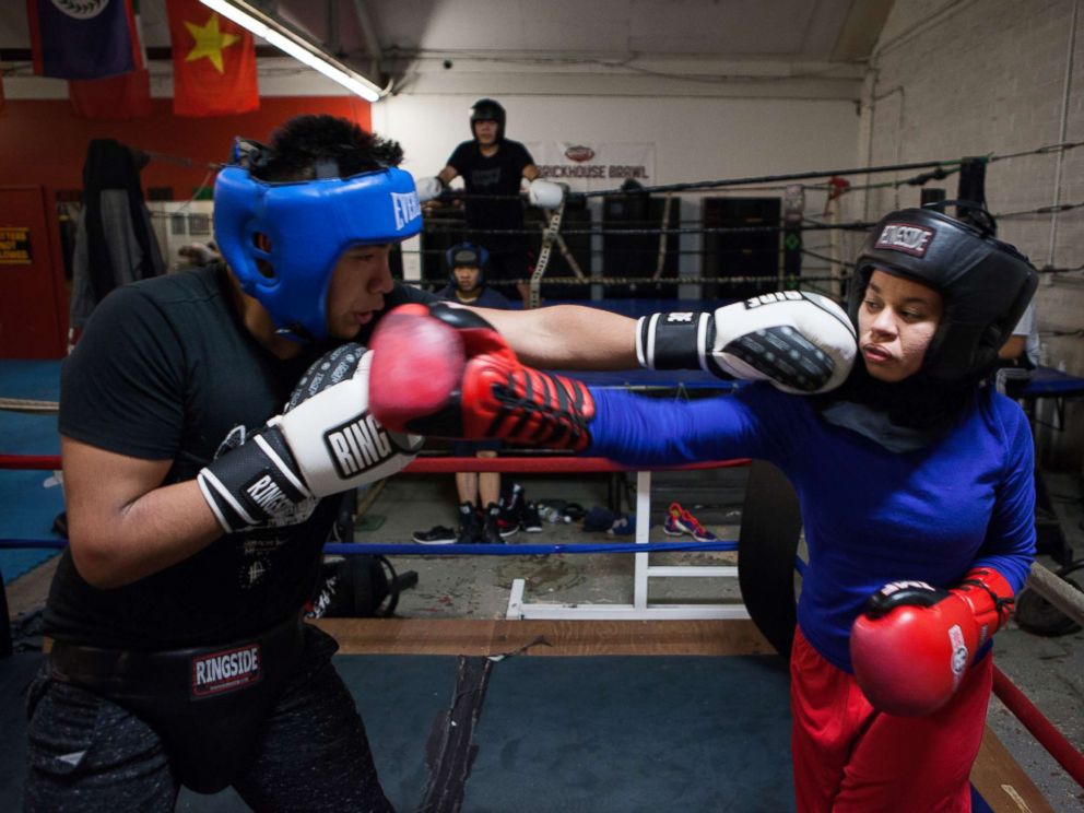 PHOTO: Amaiya Zafar spars another boxer at Circle of Discipline gym in Minneapolis.