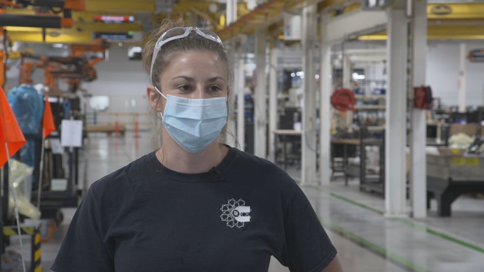 PHOTO: For Amanda Harbold, it’s been three long weeks at home. But now, she’s finally returned to her place of work on the factory floor.
