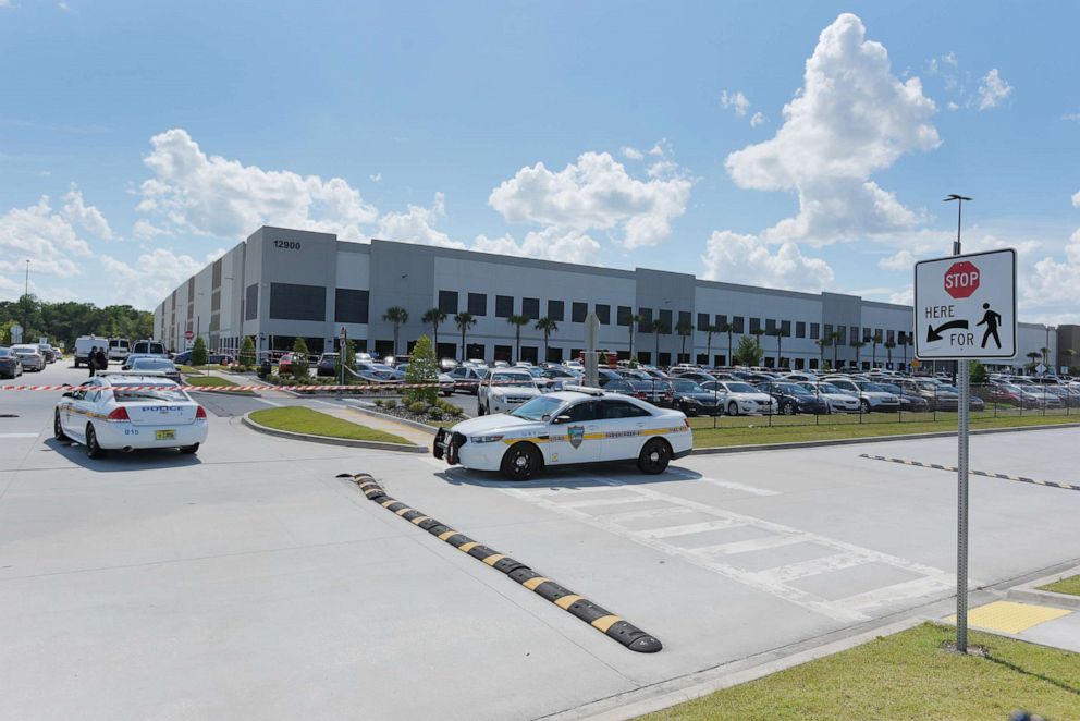 PHOTO: Law enforcement responds to a report of a shooting at the Amazon fulfillment center on Pecan Park Road near the Jacksonville International Airport in Jacksonville, Fla., June 29, 2020.
