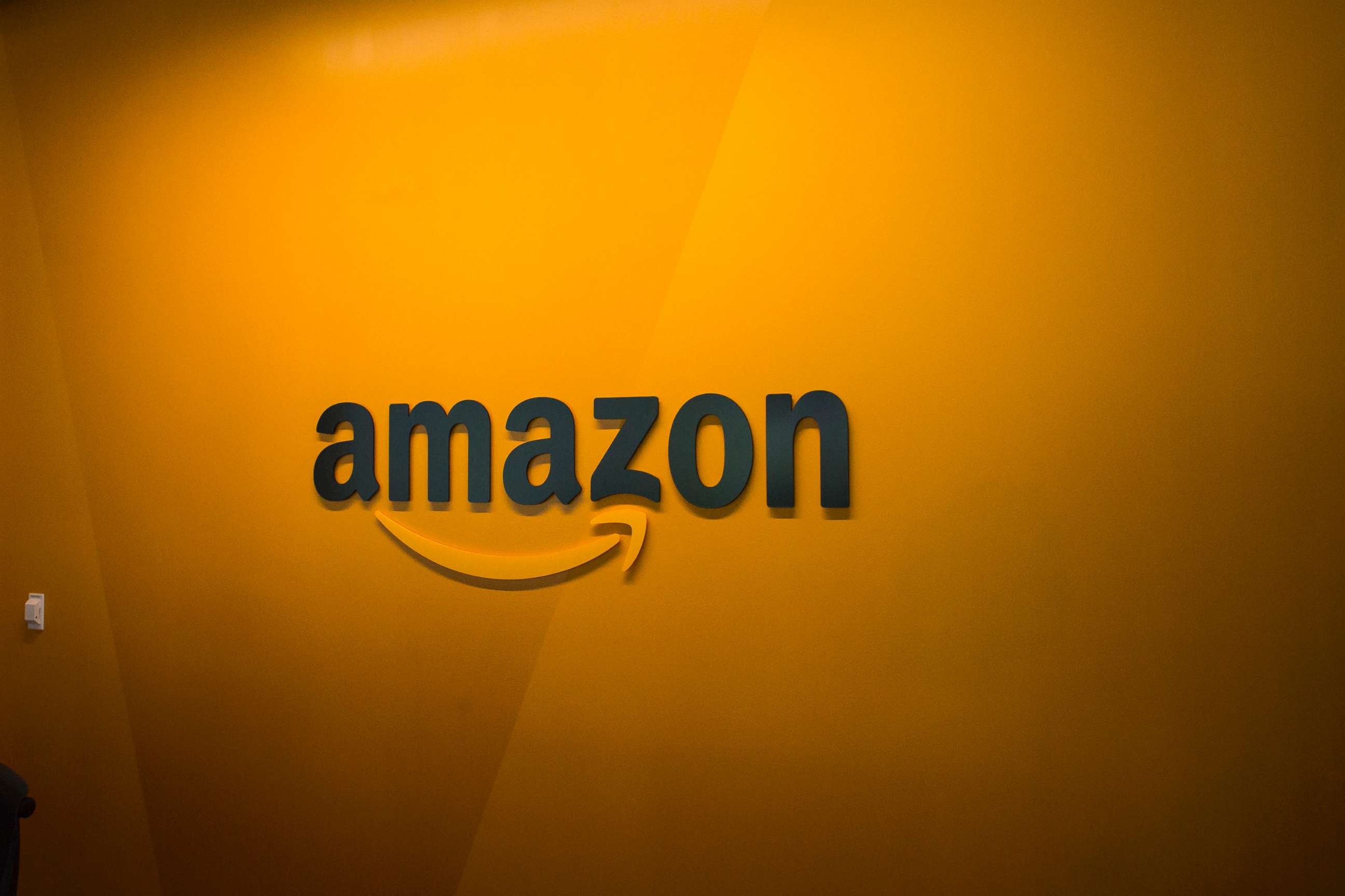 PHOTO: An Amazon logo is seen inside the Amazon corporate headquarters on June 16, 2017 in Seattle.