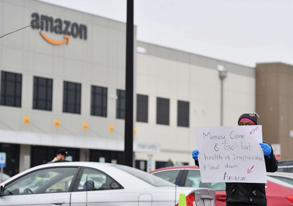 PHOTO: Amazon workers at Amazon's Staten Island warehouse strike in demand that the facility be shut down and cleaned after one staffer tested positive for the coronavirus on March 30, 2020, in New York.