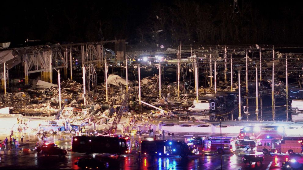 PHOTO: Emergency crews respond at a damaged Amazon.com, Inc warehouse after a tornado passed through Edwardsville, Ill., Dec. 10, 2021 in this still image taken from drone video obtained on Dec. 11, 2021.