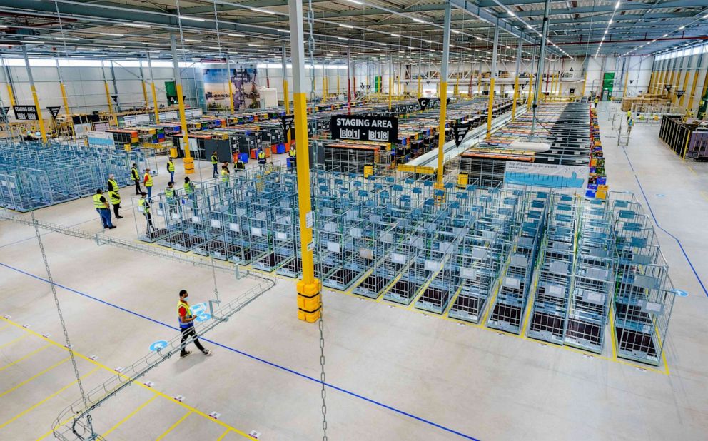 PHOTO: (FILES) This file photo taken on July 13, 2021 shows the new delivery warehouse of the US e-commerce company Amazon in Rozenburg-Schiphol.